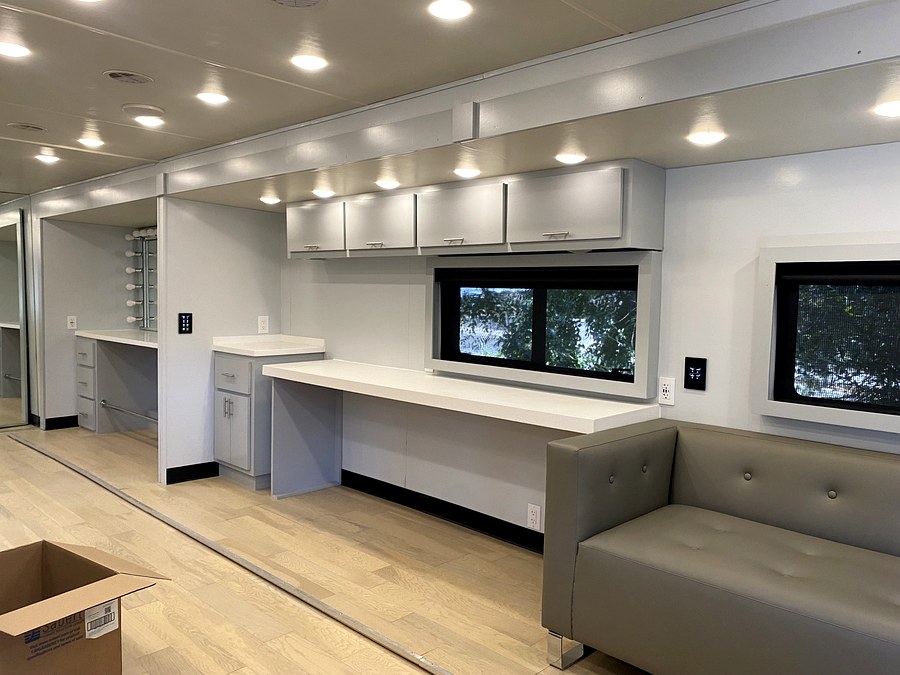 Makeup stations inside a production trailer
