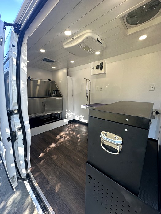 White grooming van interior stainless tub